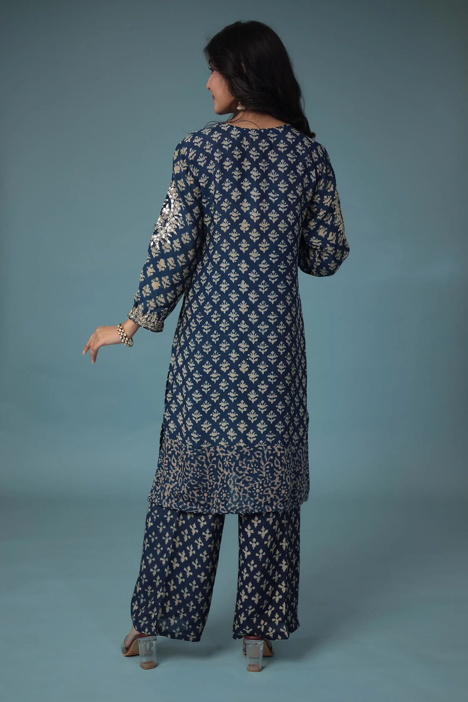 Cotton Silk Dabu Print Suit with Hand Aari work.